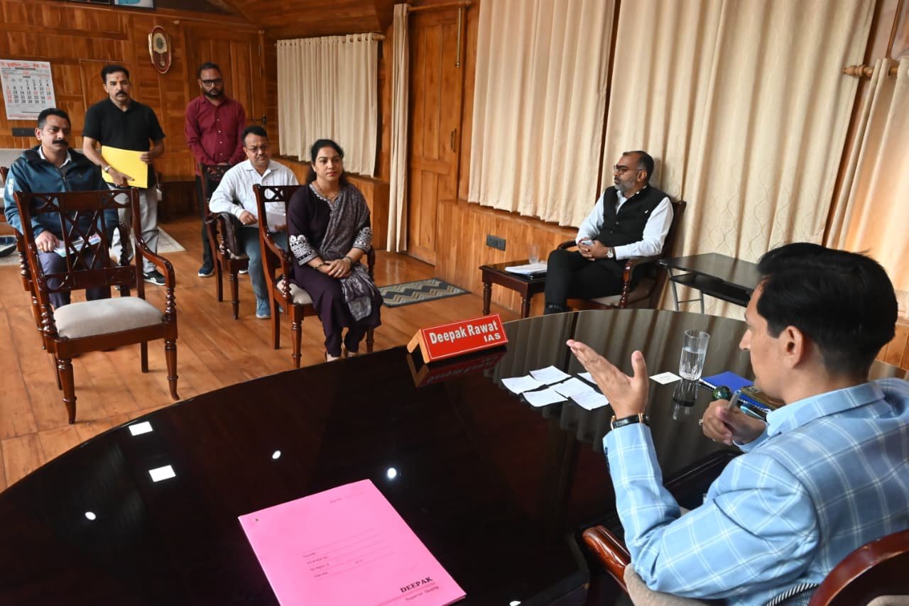 Kumaon Commissioner Deepak Rawat listening to public grievances in Nainital