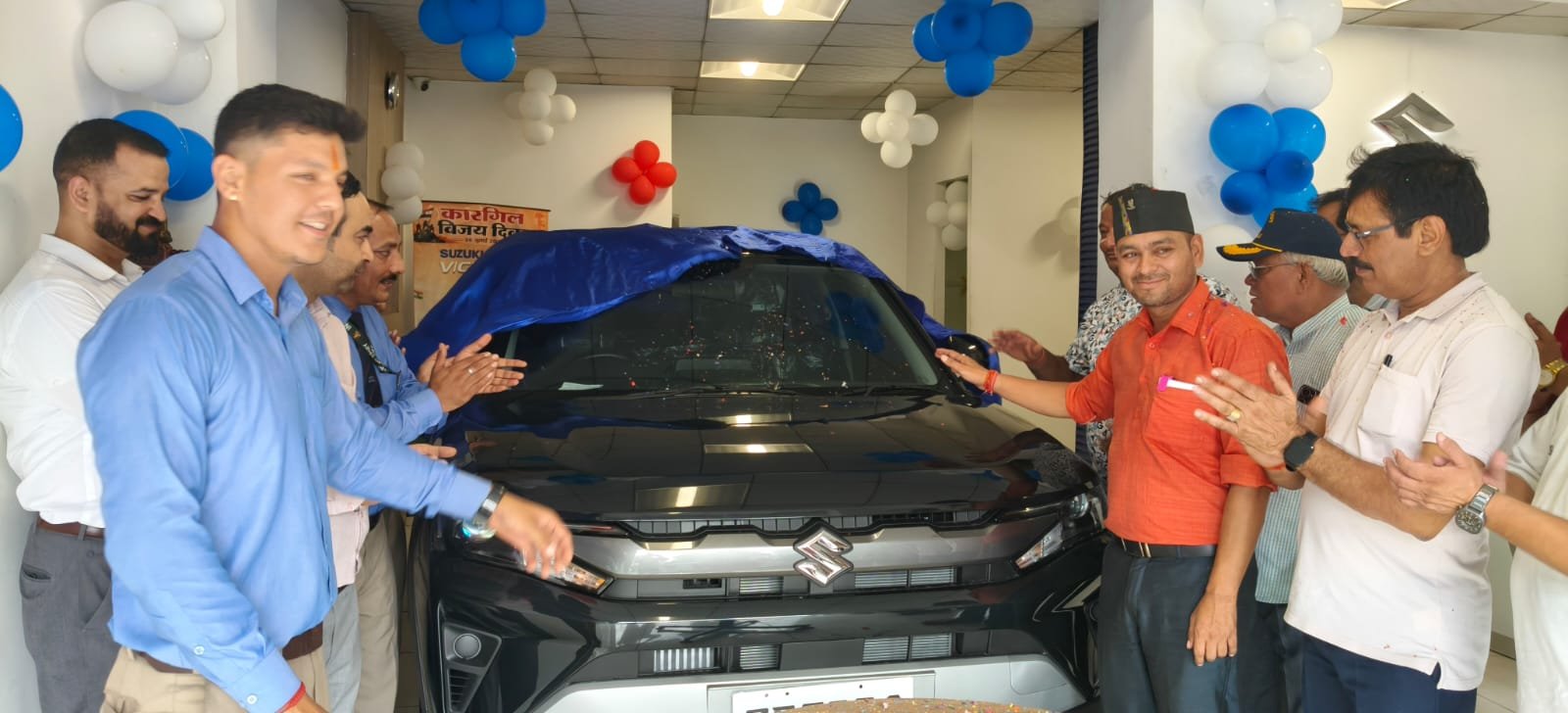Nagar Panchayat Chairman Surendra Singh Lotni Unveiling Maruti Vitara Brezza Turbo in Lalkuan