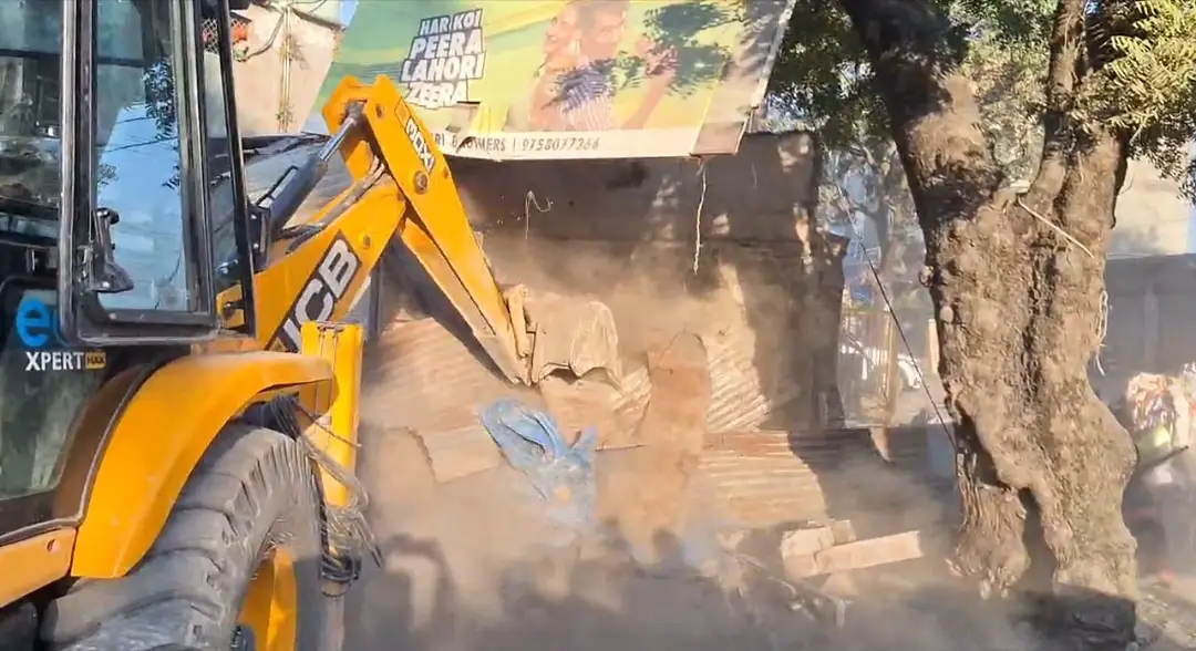 Uttarakhand Development Concept Representing Road Widening and Bulldozer Action in Haldwani